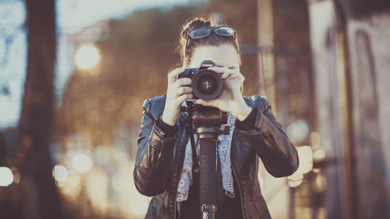 Female Photographer Taking a Photo