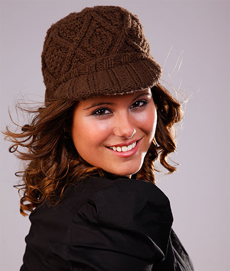 Girl wearing brown winter cape